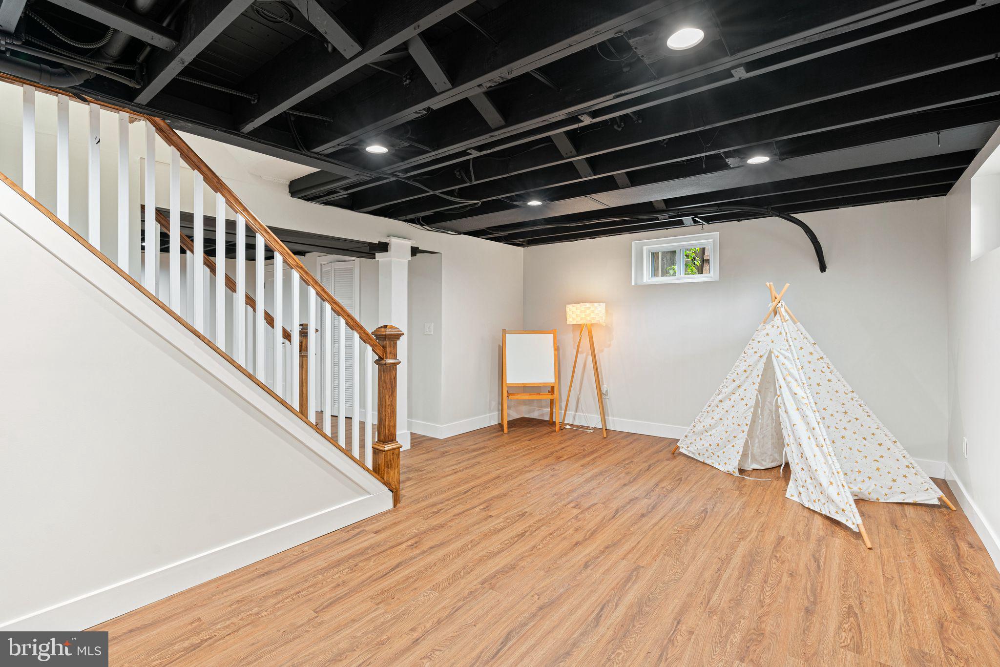 116 Rhoads Avenue Haddonfield, NJ 08033 - Photo 23 of 29 a view of an empty room with wooden floor