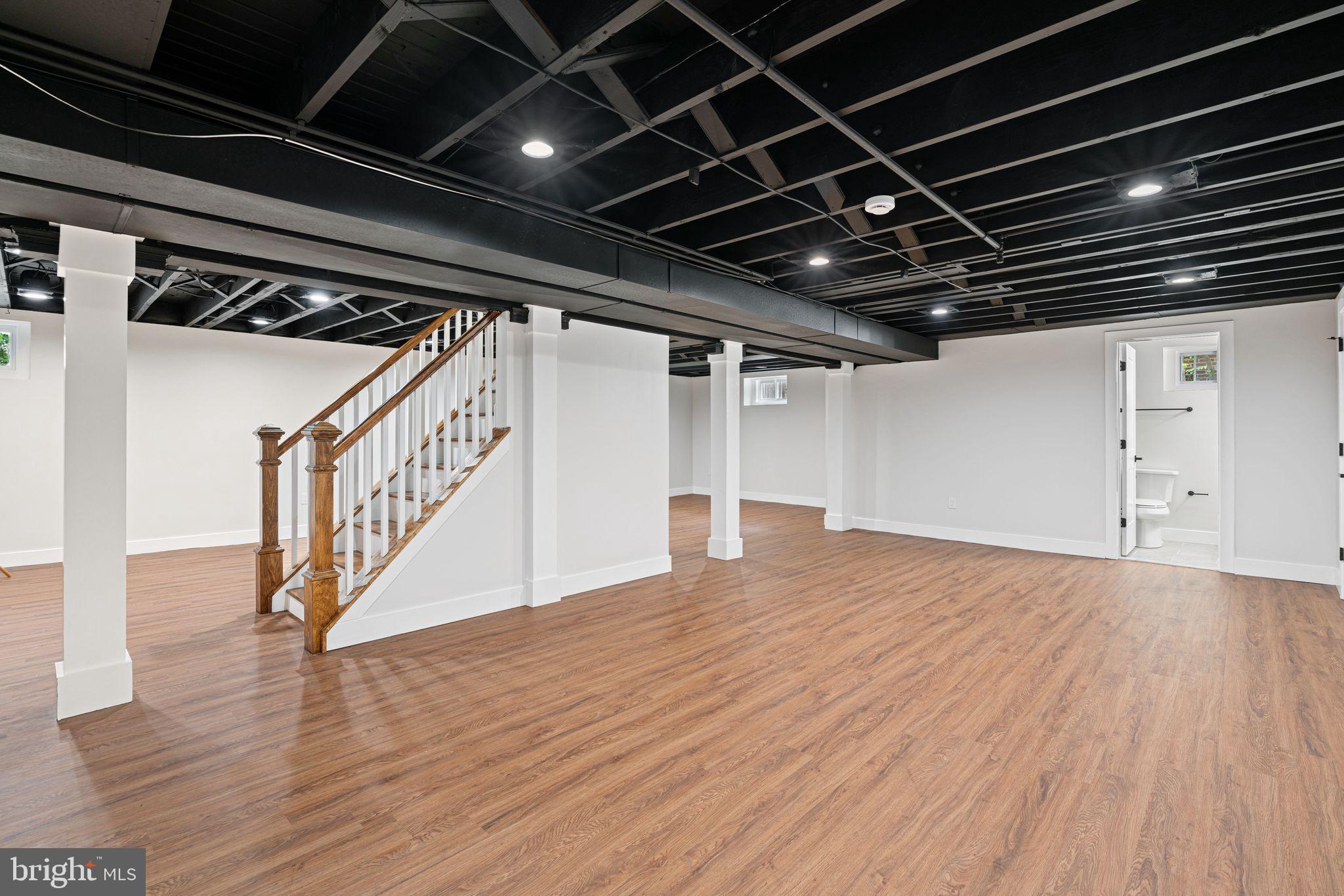 116 Rhoads Avenue Haddonfield, NJ 08033 - Photo 24 of 29 a view of an empty room with wooden floor