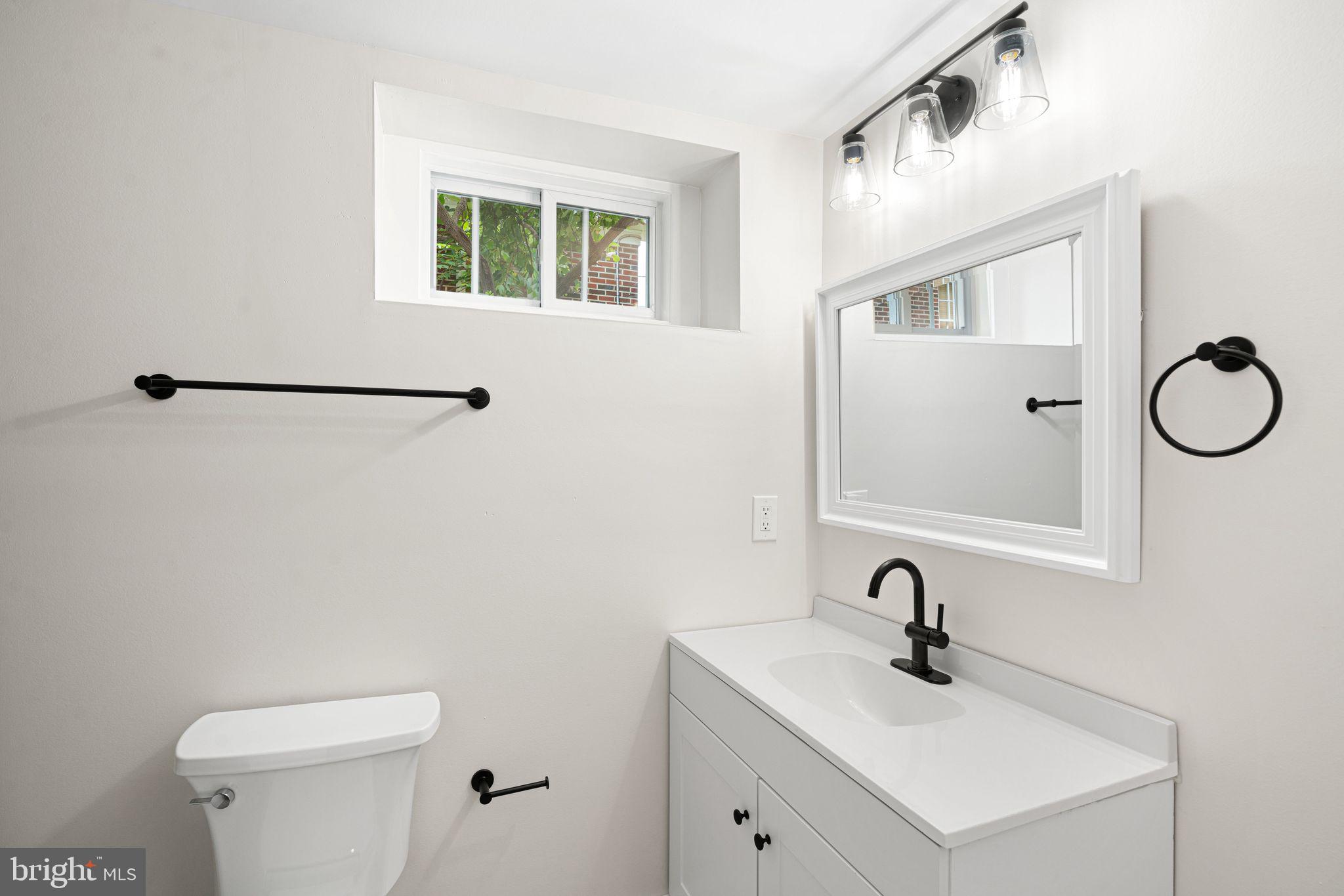 116 Rhoads Avenue Haddonfield, NJ 08033 - Photo 25 of 29 a bathroom with a sink and a toilet