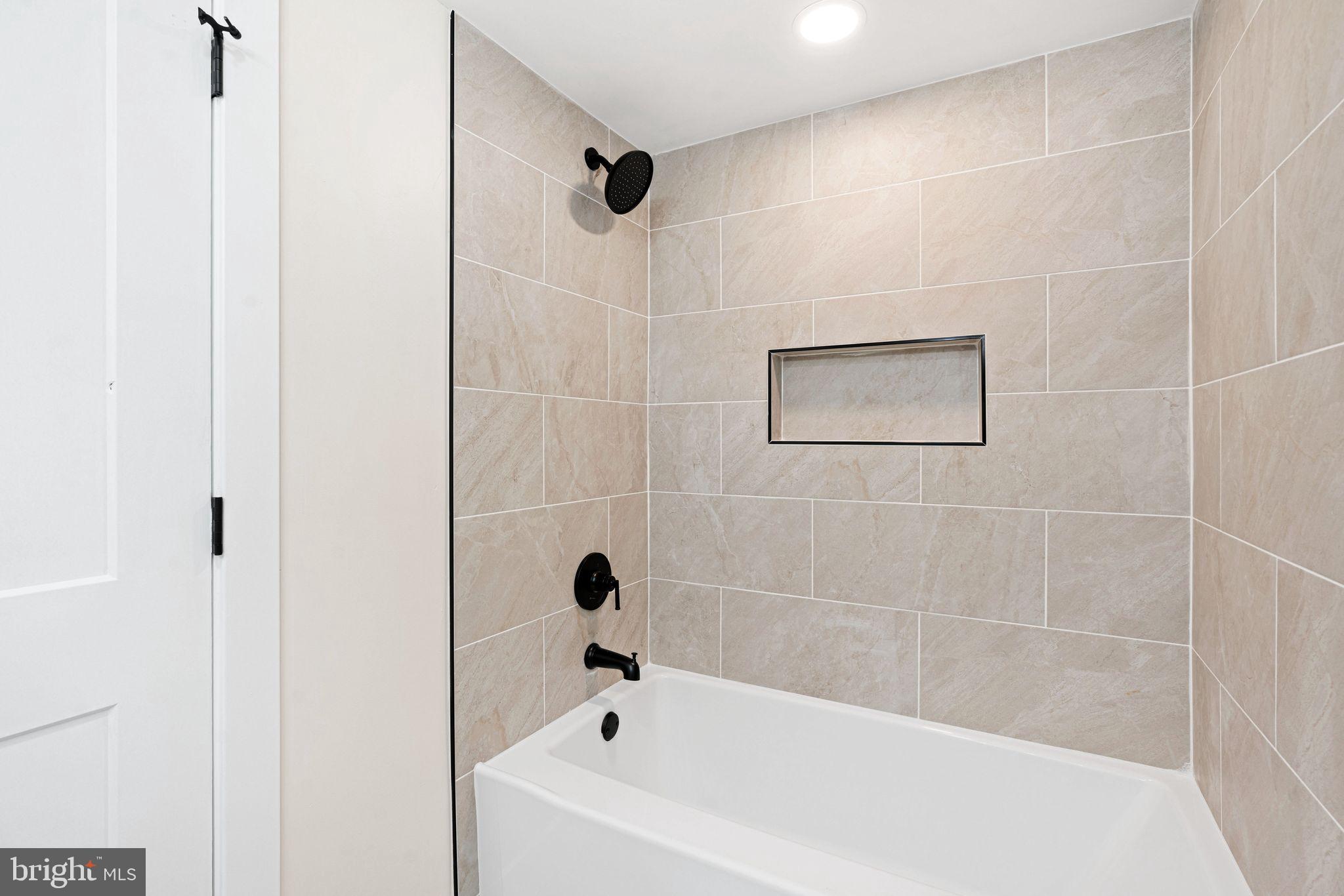 116 Rhoads Avenue Haddonfield, NJ 08033 - Photo 26 of 29 a bathroom with a bathtub