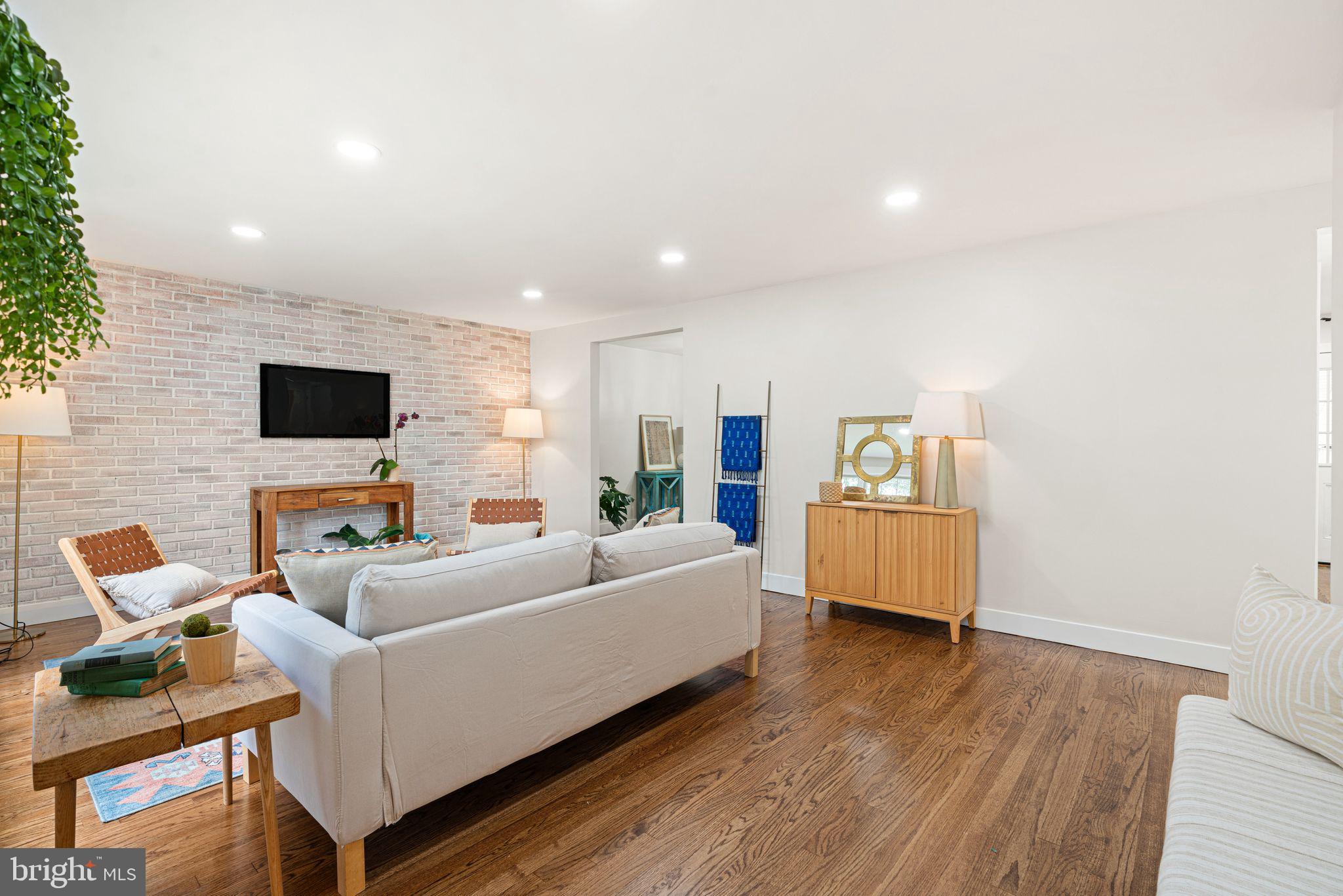 116 Rhoads Avenue Haddonfield, NJ 08033 - Photo 4 of 29 a living room with furniture and a flat screen tv