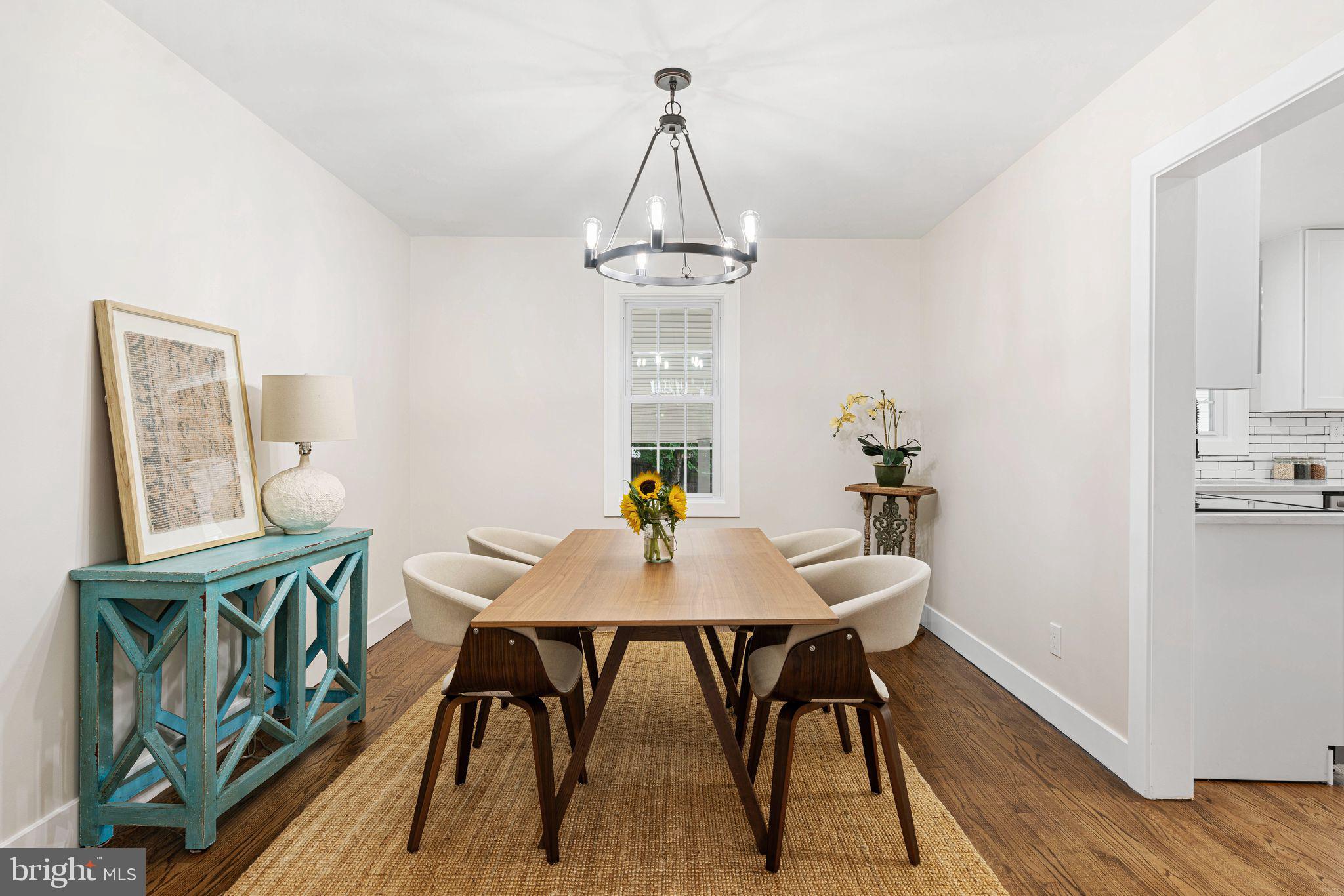 116 Rhoads Avenue Haddonfield, NJ 08033 - Photo 5 of 29 a view of a dining room with furniture window and wooden floor