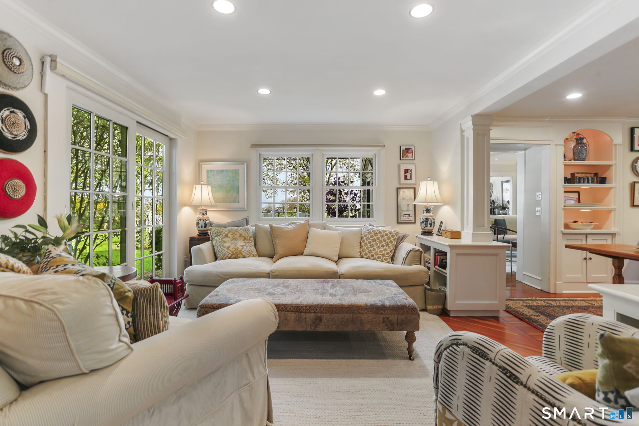 29 Old Saugatuck Road Norwalk, CT 06855 - Photo 13 of 34 a living room with furniture and large windows