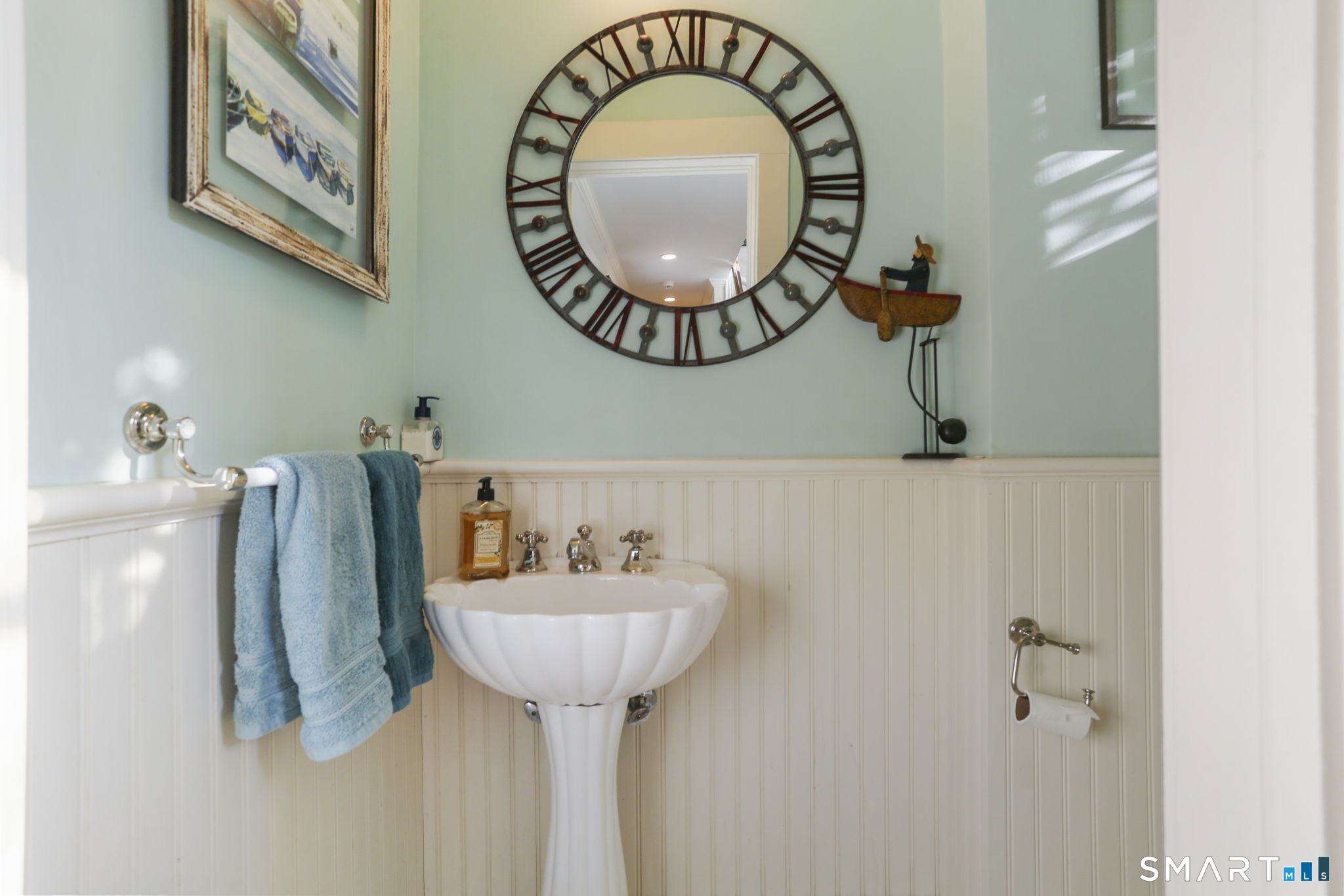 29 Old Saugatuck Road Norwalk, CT 06855 - Photo 16 of 34 a bathroom with a sink and a mirror