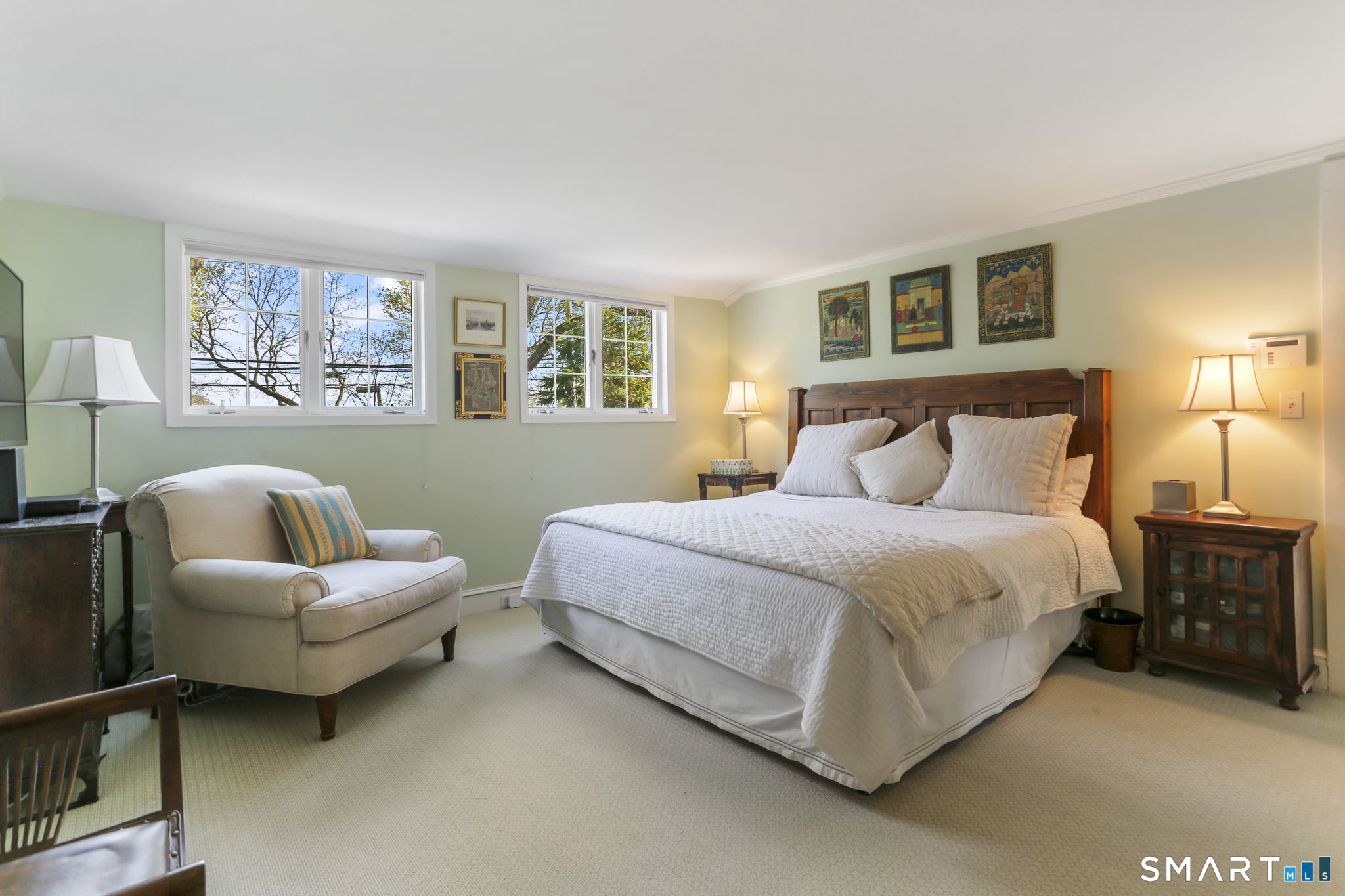 29 Old Saugatuck Road Norwalk, CT 06855 - Photo 22 of 34 a bedroom with a bed and a couch