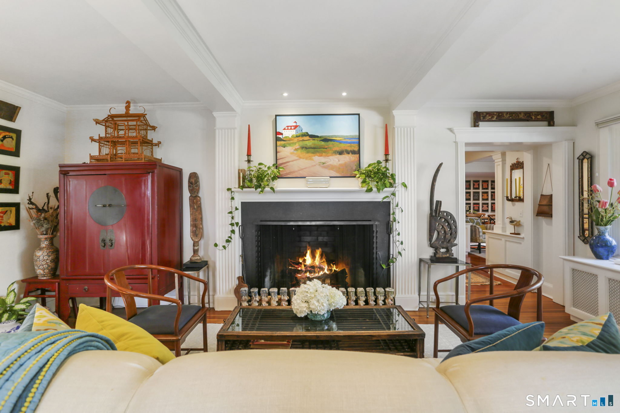 29 Old Saugatuck Road Norwalk, CT 06855 - Photo 7 of 34 a living room with furniture a fireplace and a potted plant