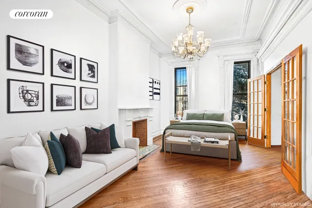 a view of a patio with table and chairs with wooden floor and fence