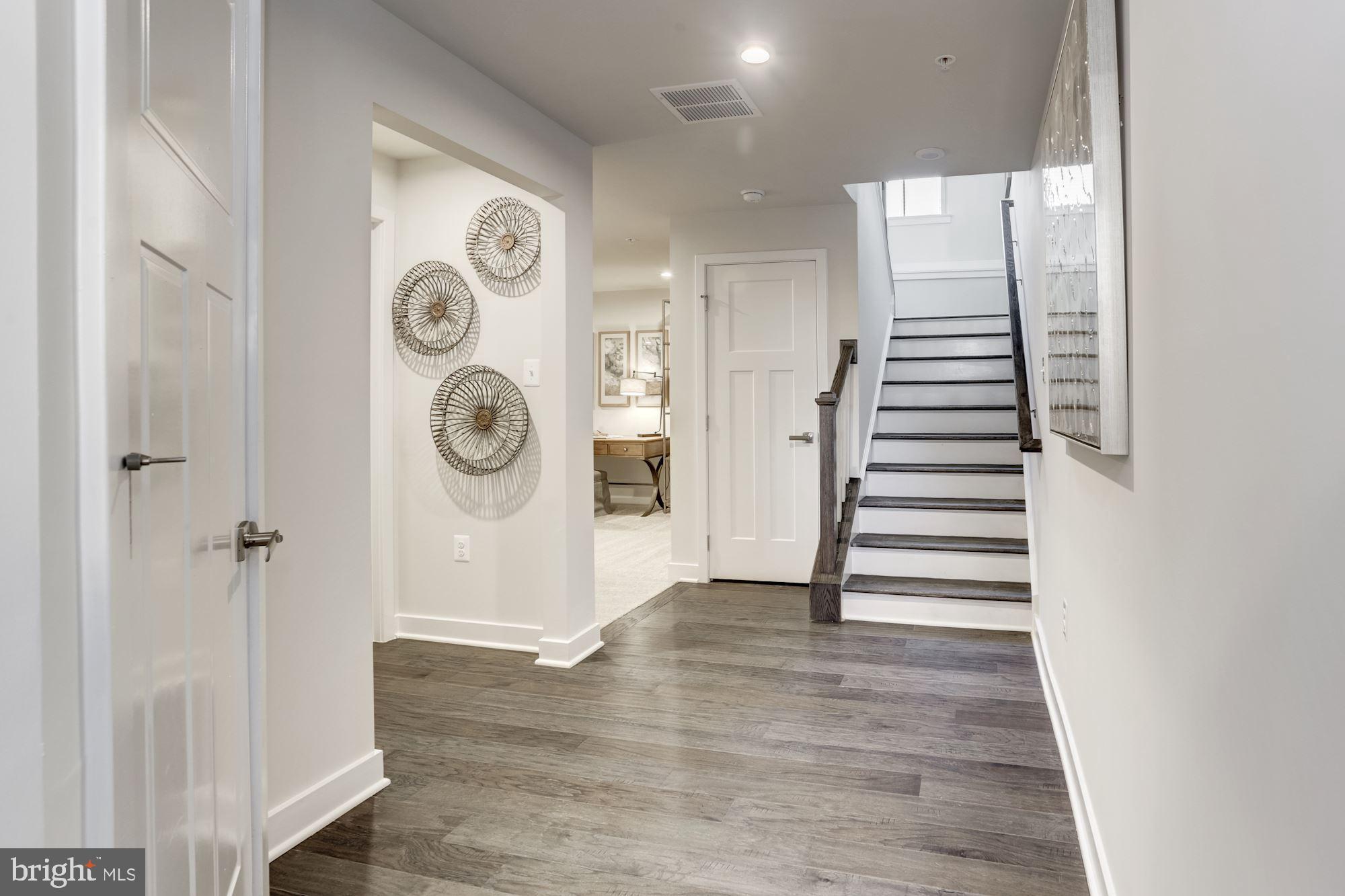 7892 Brandy Station Road, Unit SERENADE Hanover, MD 21076 - Photo 11 of 30 FOYER AND STAIRS TO MAIN LEVEL