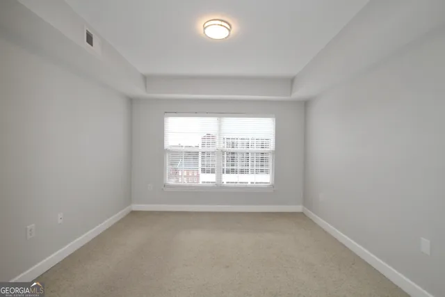 an empty room with a window