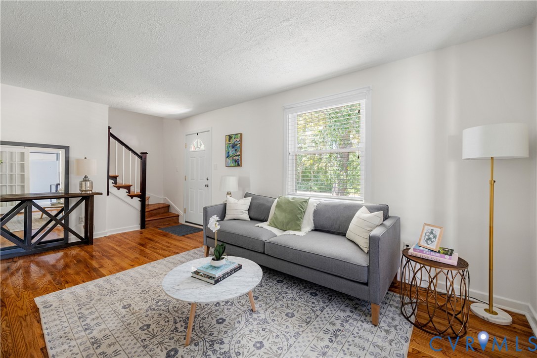 701 Rothesay Road Richmond, VA 23221 - Photo 5 of 38 Large, bright living room with lovely hardwood flo