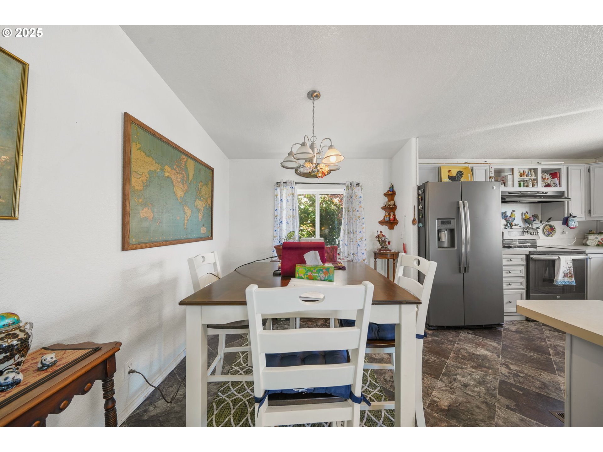 39098 Dexter Road, Unit 8A Dexter, OR 97431 - Photo 6 of 22 a view of a dining room with furniture wooden floor and chandelier