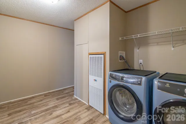 a view of a storage & utility room with washer and dryer