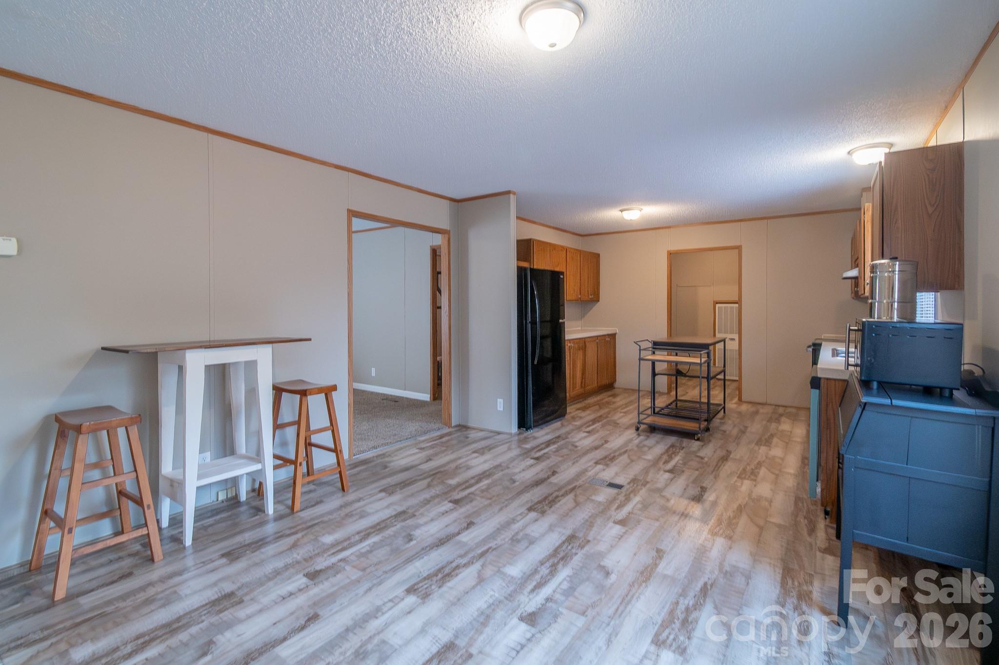 6706 Patrick Highway Patrick, SC 29584 - Photo 27 of 43 a living room with furniture and a wooden floor