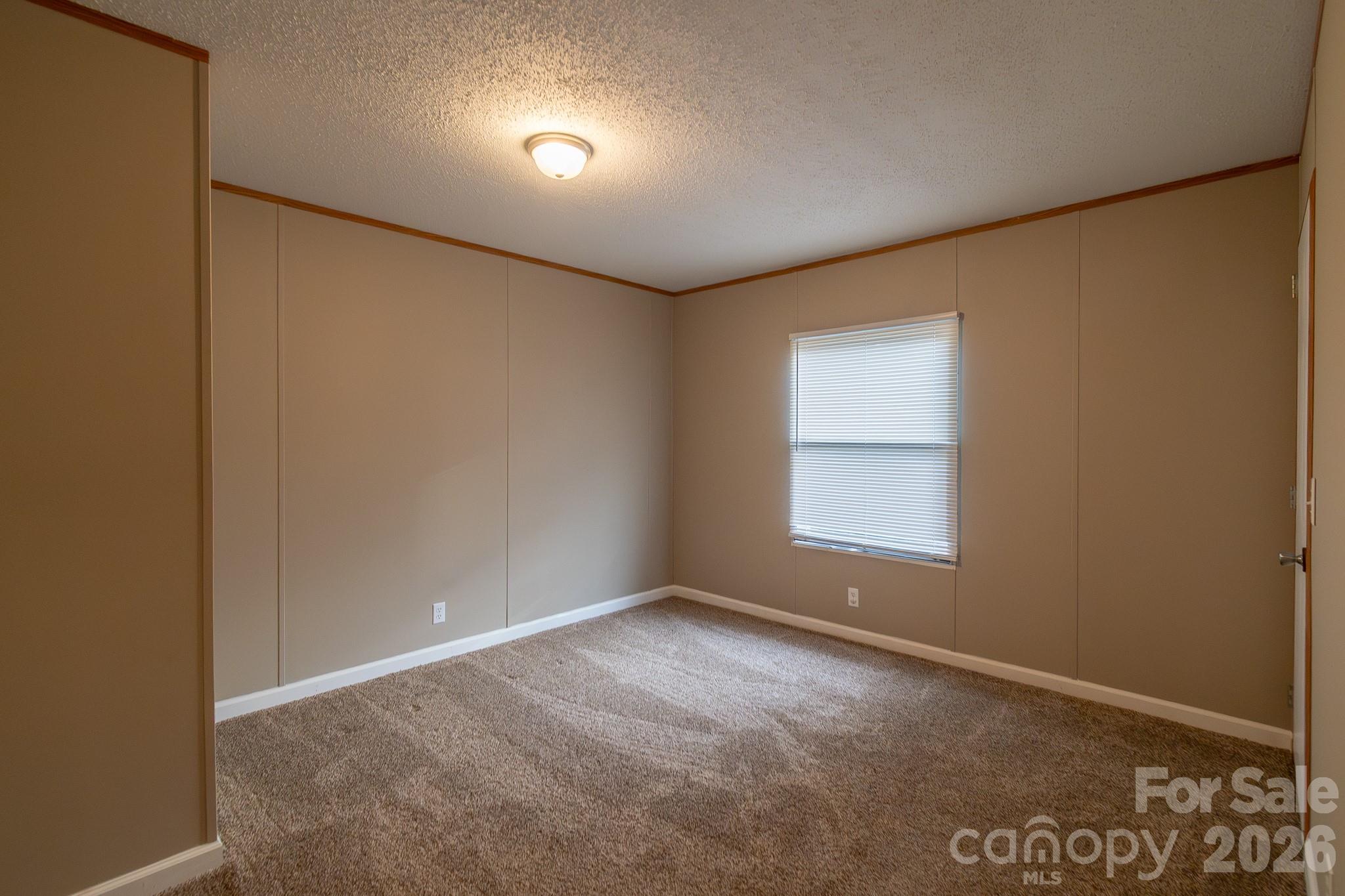 6706 Patrick Highway Patrick, SC 29584 - Photo 8 of 43 a view of an empty room with a window