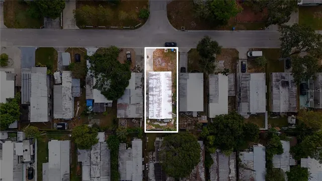 a front view of house and yard with green space