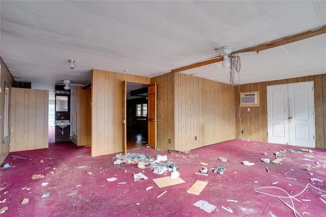 a bedroom with a bed and a closet