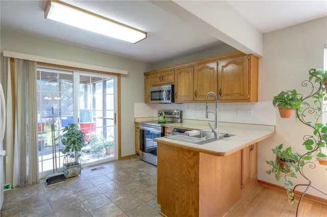 $340,000 | 117 Southwest Tess Drive, Lee's Summit, MO 64081