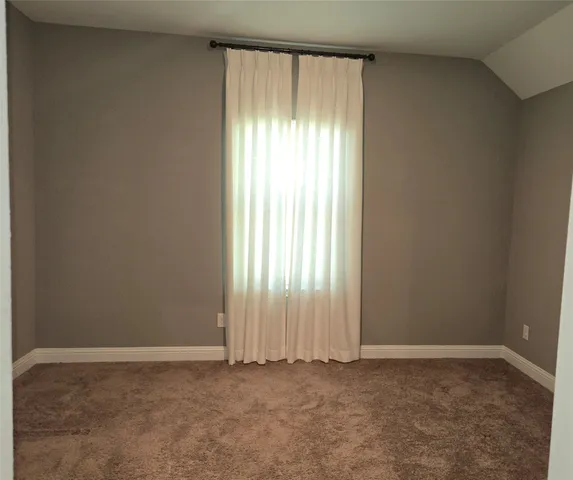 an empty room with window