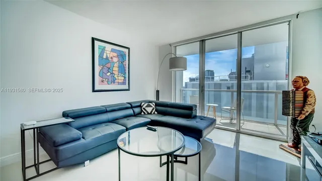 a living room with furniture and a couch