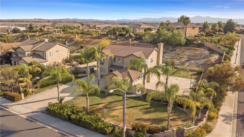 6001 Cannich Road Riverside, CA 92507 - Photo 1 of 1 an aerial view of residential houses with outdoor space