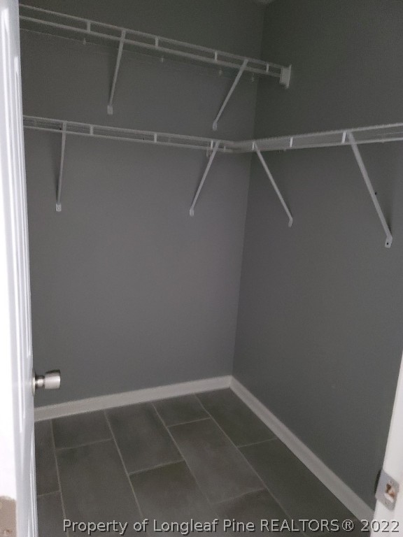 5042 Summer Ridge Road Fayetteville, NC 28303 - Photo 13 of 17 a view of an empty walk in closet
