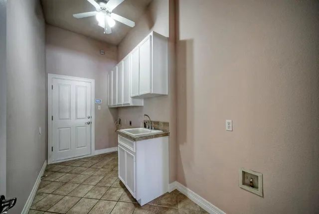 a view of a storage & utility room with wooden floor