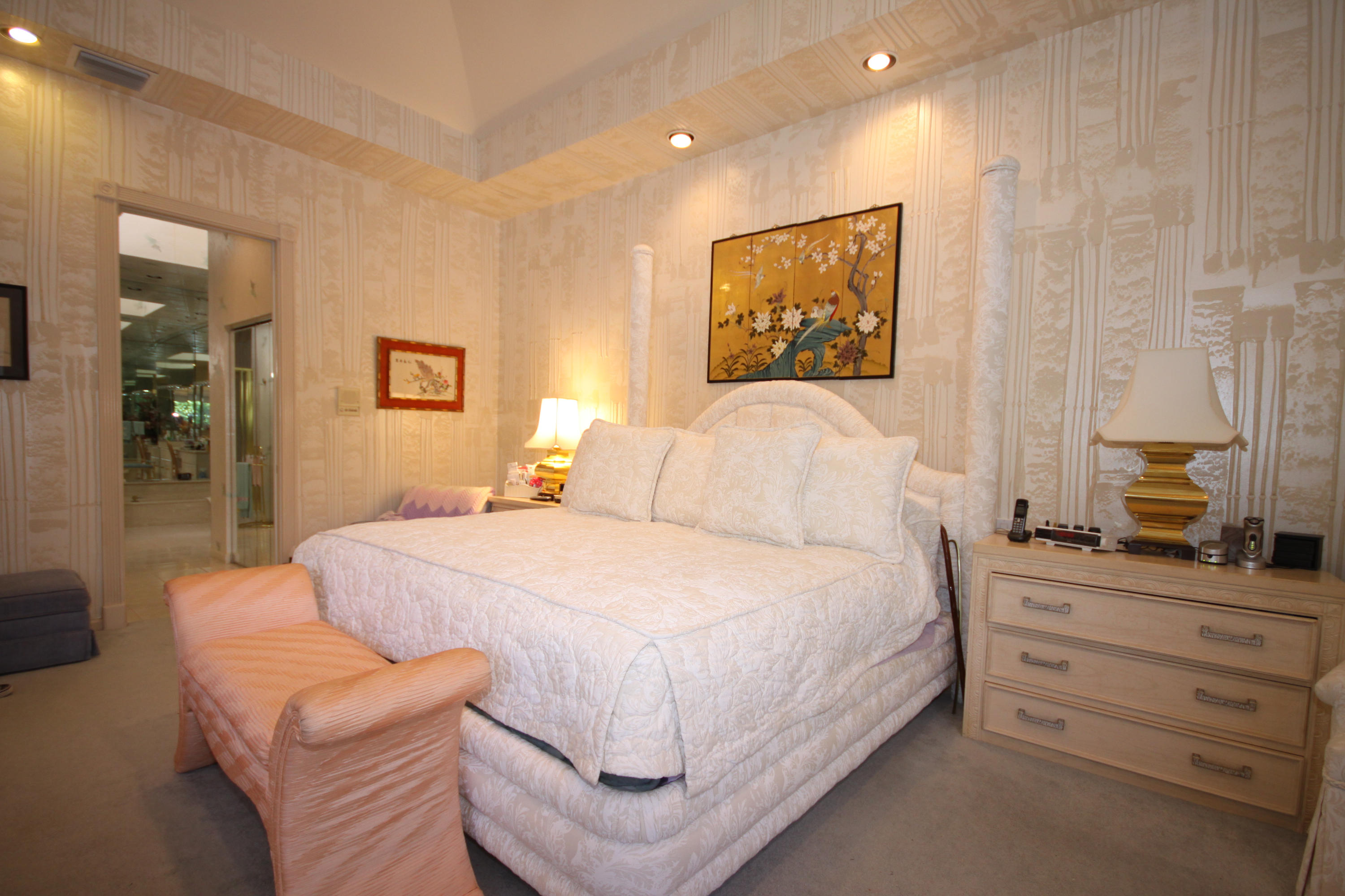 2264 Northwest 60th Street Boca Raton, FL 33496 - Photo 17 of 19 a bedroom with a bed and a couch