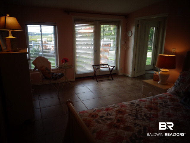 6674 Cook Road Foley, AL 36535 - Photo 32 of 45 Door to deck overlooking water.