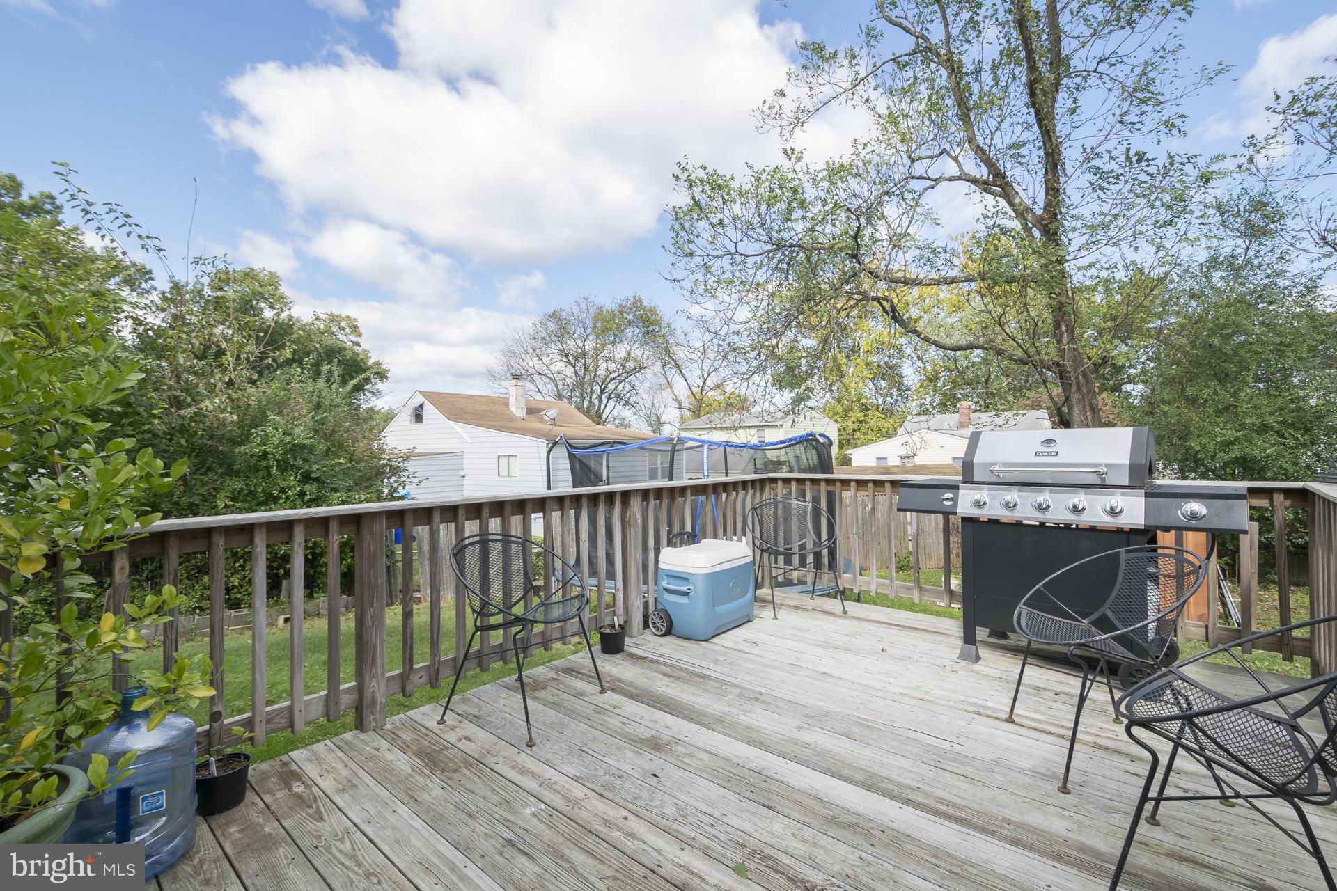 12217 Charles Road Silver Spring, MD 20906 - Photo 30 of 30 a view of a deck with chair and wooden floor
