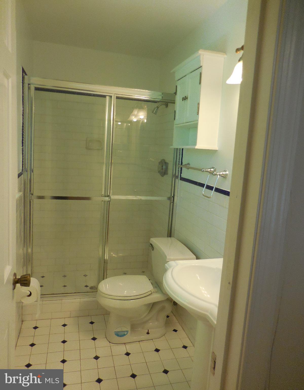508 Holly Road Fort Washington, MD 20744 - Photo 13 of 29 a bathroom with a toilet and a shower