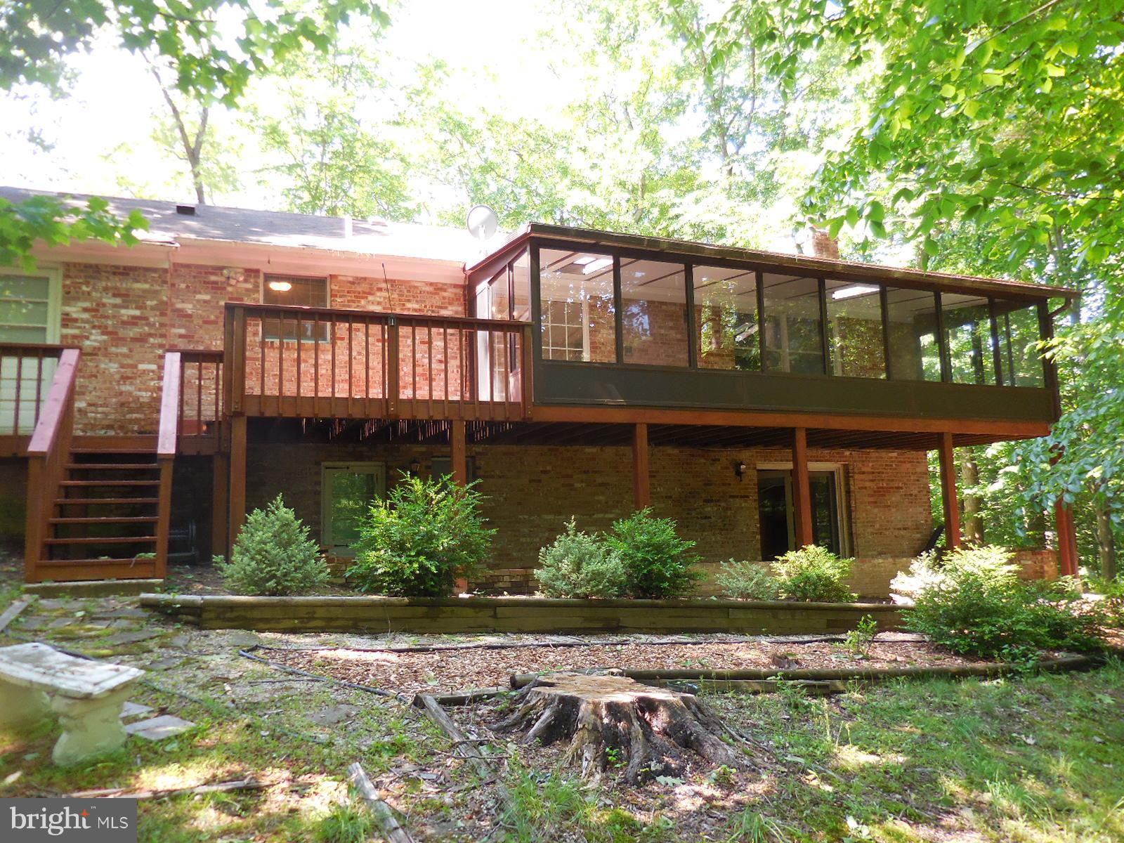508 Holly Road Fort Washington, MD 20744 - Photo 21 of 29 a front view of a house with garden