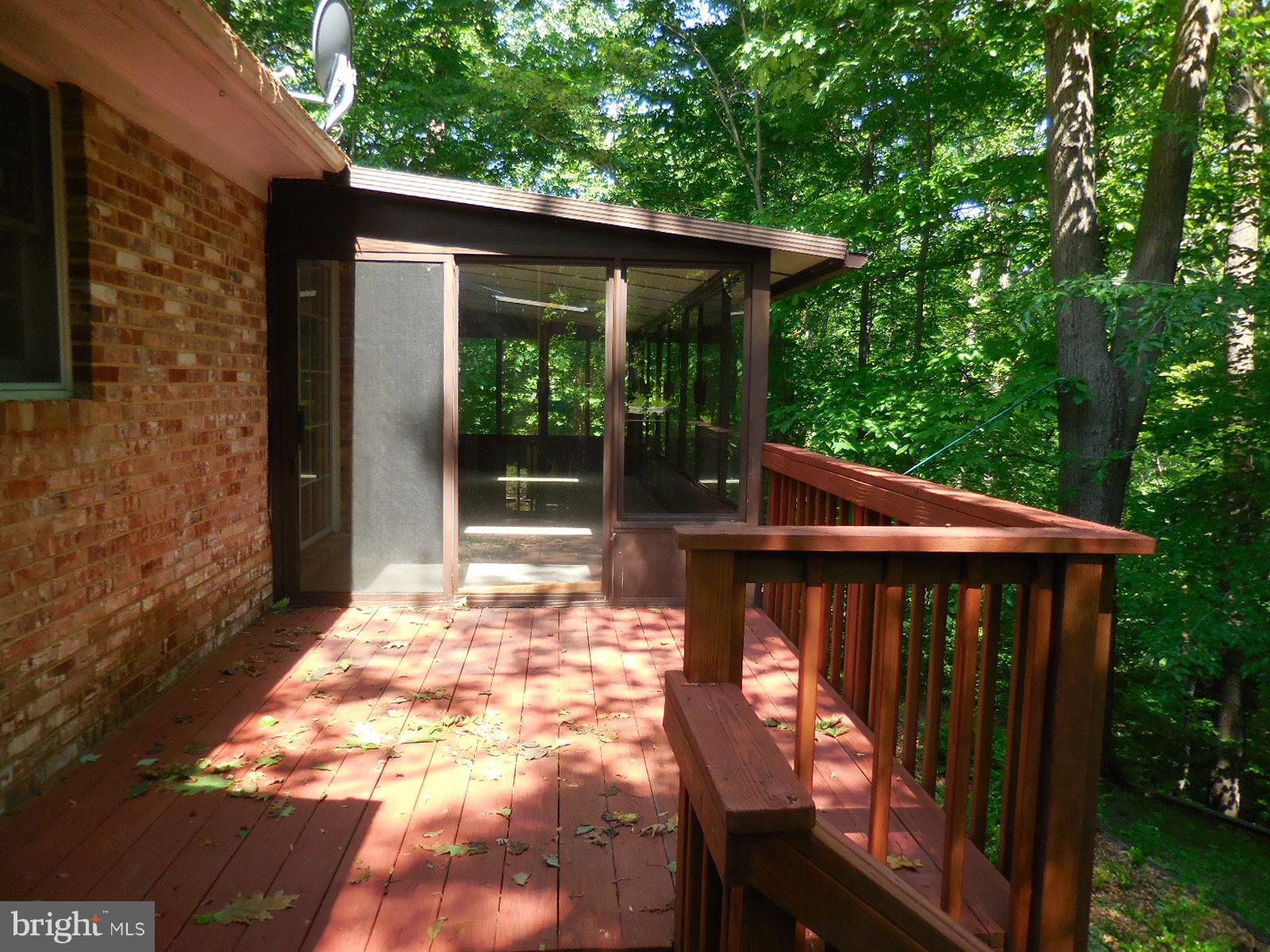 508 Holly Road Fort Washington, MD 20744 - Photo 24 of 29 a view of a wooden deck and a backyard