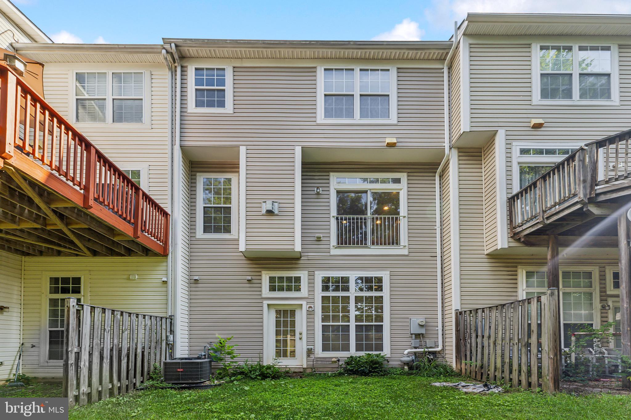49 Inkberry Circle Gaithersburg, MD 20877 - Photo 25 of 25 a view of a brick house with a yard