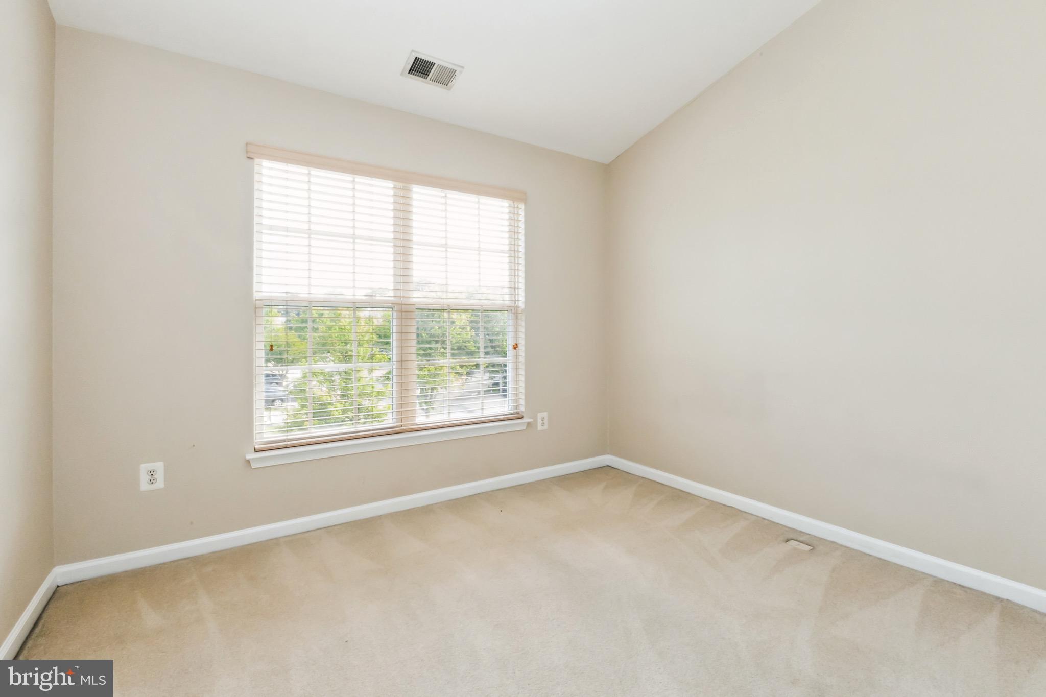 49 Inkberry Circle Gaithersburg, MD 20877 - Photo 10 of 25 an empty room with a window