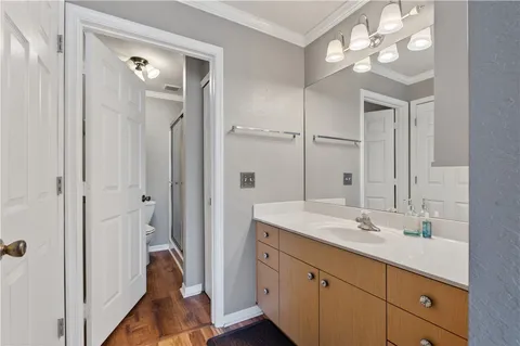 a spacious bathroom with a double vanity sink mirror and double