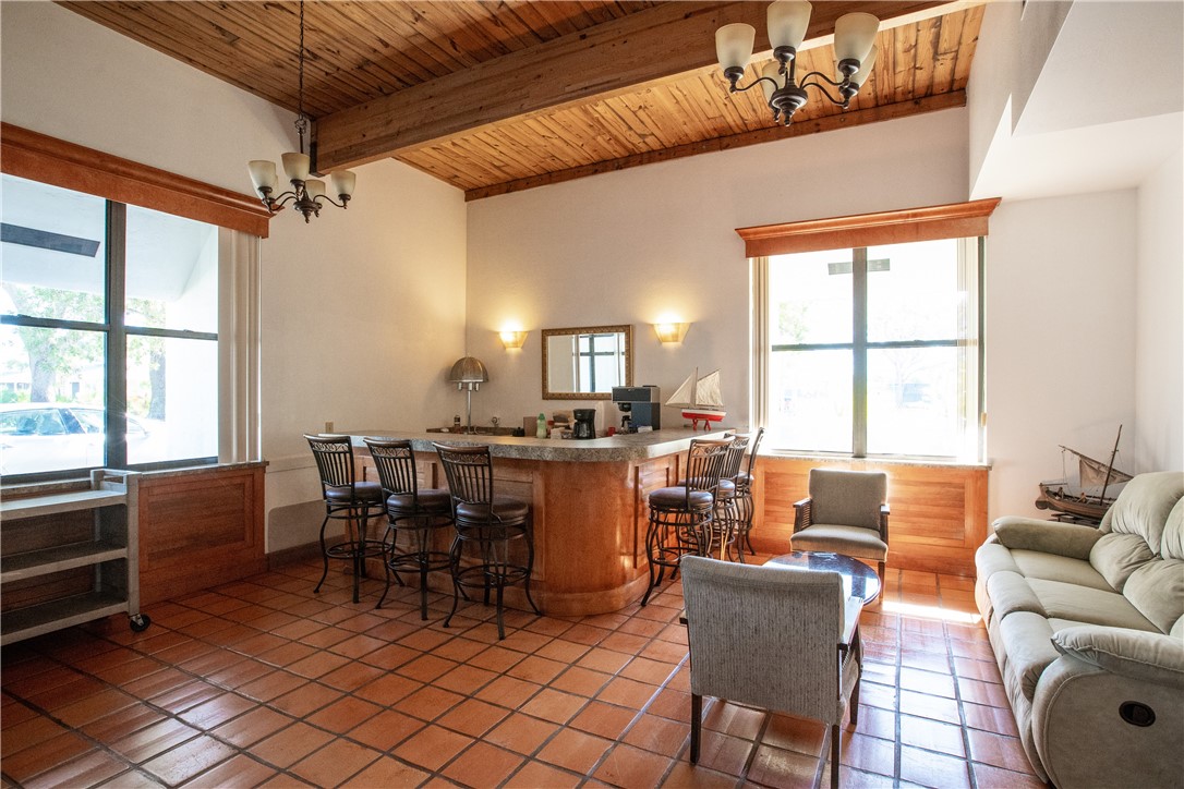 14339 Amapola Circle Fort Pierce, FL 34951 - Photo 32 of 36 a dining room with furniture and window