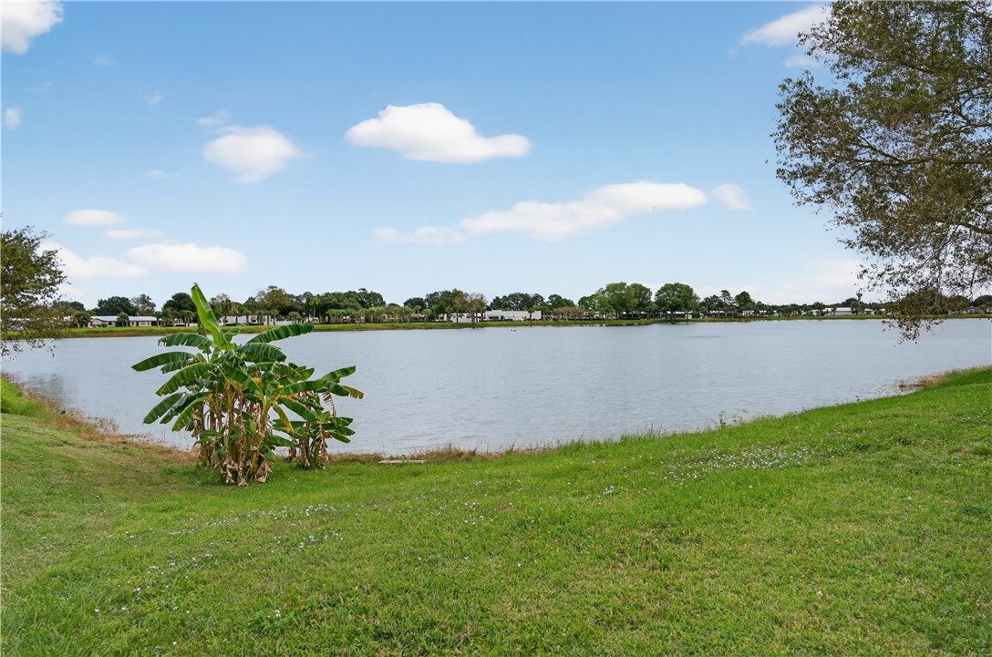 14339 Amapola Circle Fort Pierce, FL 34951 - Photo 5 of 36 a lake with a big yard