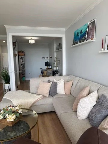 a living room with furniture and a couch