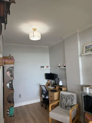 a workspace with furniture and window