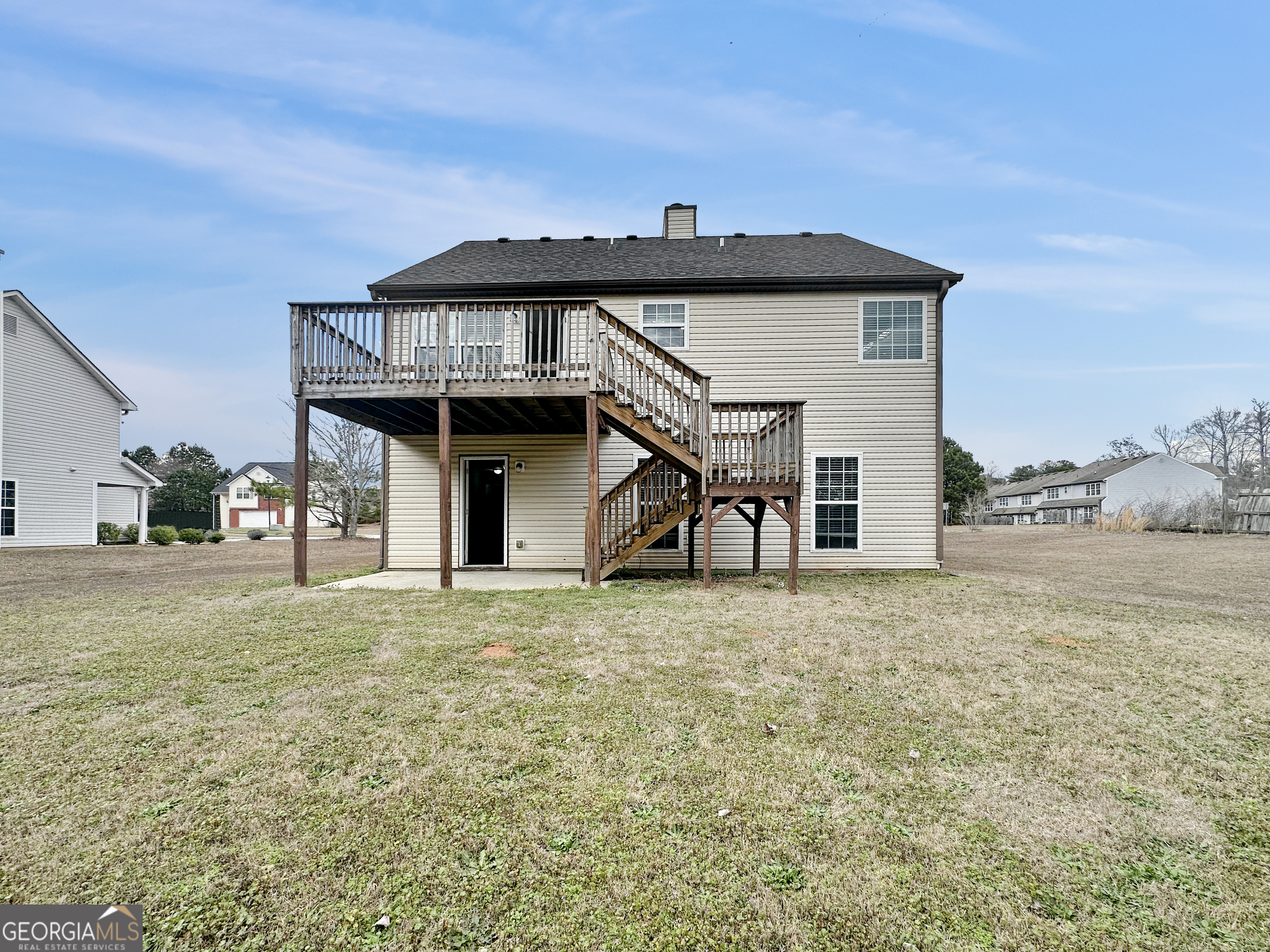 105 Aprils Way Union City, GA 30291 - Photo 18 of 20 a front view of a house with a garden