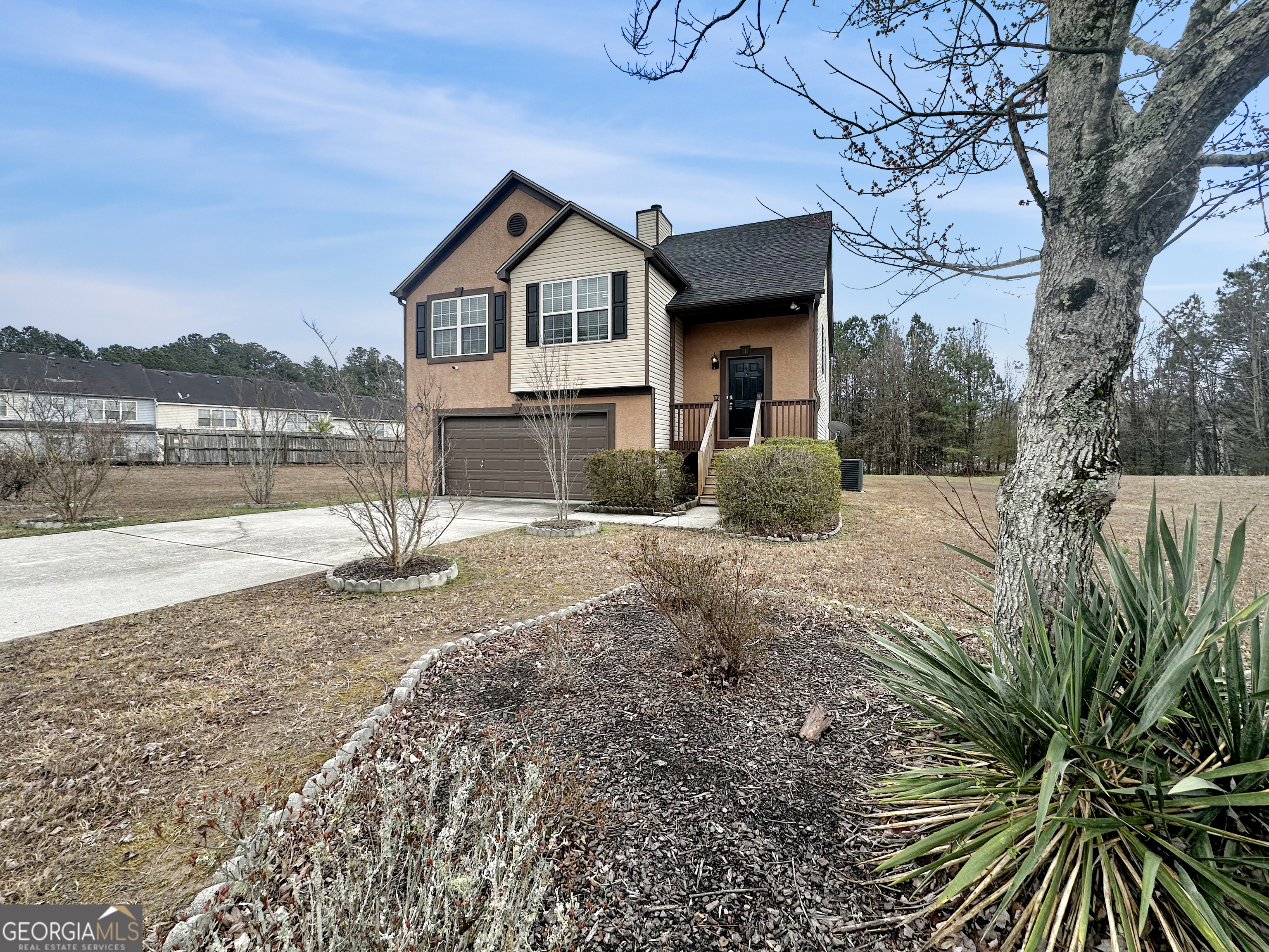 105 Aprils Way Union City, GA 30291 - Photo 3 of 20 a front view of a house with a yard and mountain view