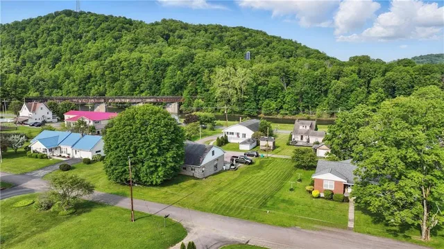 a backyard of a house with lots of green space