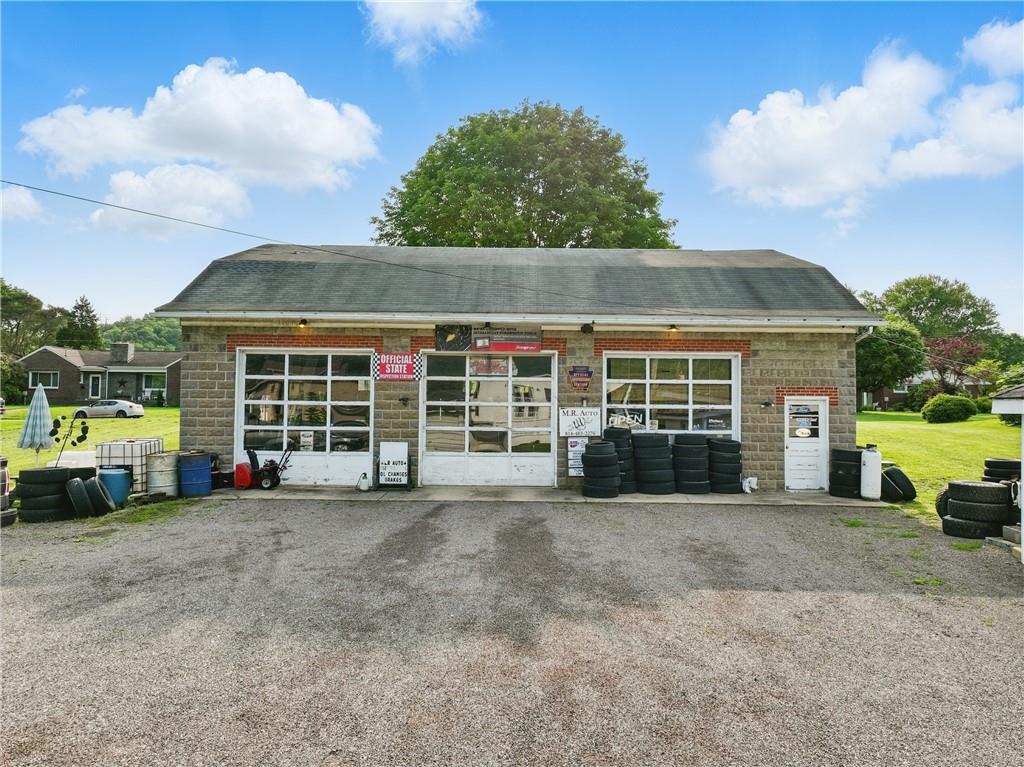 833 Oden Street Confluence, PA 15424 - Photo 17 of 48 a view of a house with a yard and parking space