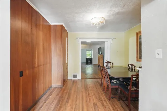 a very nice looking room with wooden floor