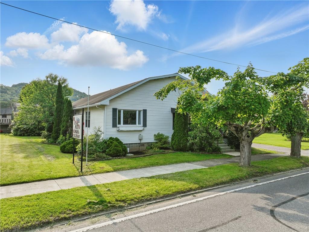 833 Oden Street Confluence, PA 15424 - Photo 2 of 48 a front view of a house with a yard