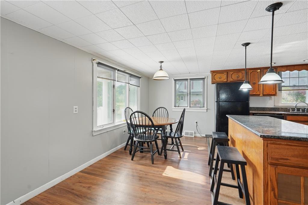 833 Oden Street Confluence, PA 15424 - Photo 28 of 48 a dining room with furniture and window