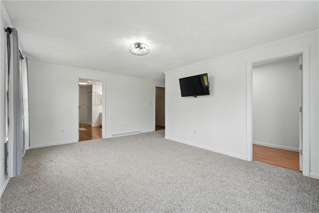 833 Oden Street Confluence, PA 15424 - Photo 42 of 48 an empty room with windows and television