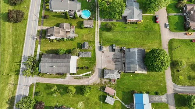 an aerial view of a house with a garden