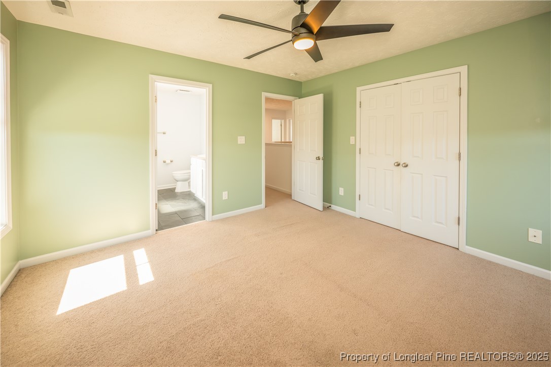 2112 Yellowbrick Road Fayetteville, NC 28314 - Photo 22 of 48 a view of a big room with wooden floor and windows in a room