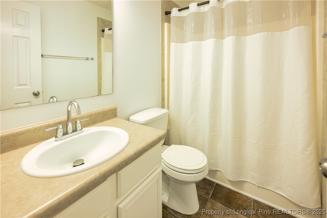 2112 Yellowbrick Road Fayetteville, NC 28314 - Photo 34 of 48 a bathroom with a sink and a toilet